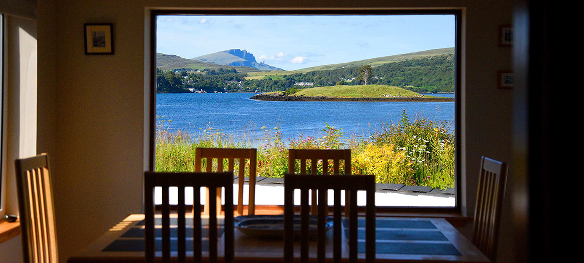 Caberfeidh Boat House looks on to amazing sea views of Portree Bay and the Old Man of Storr from our self catering accommodation