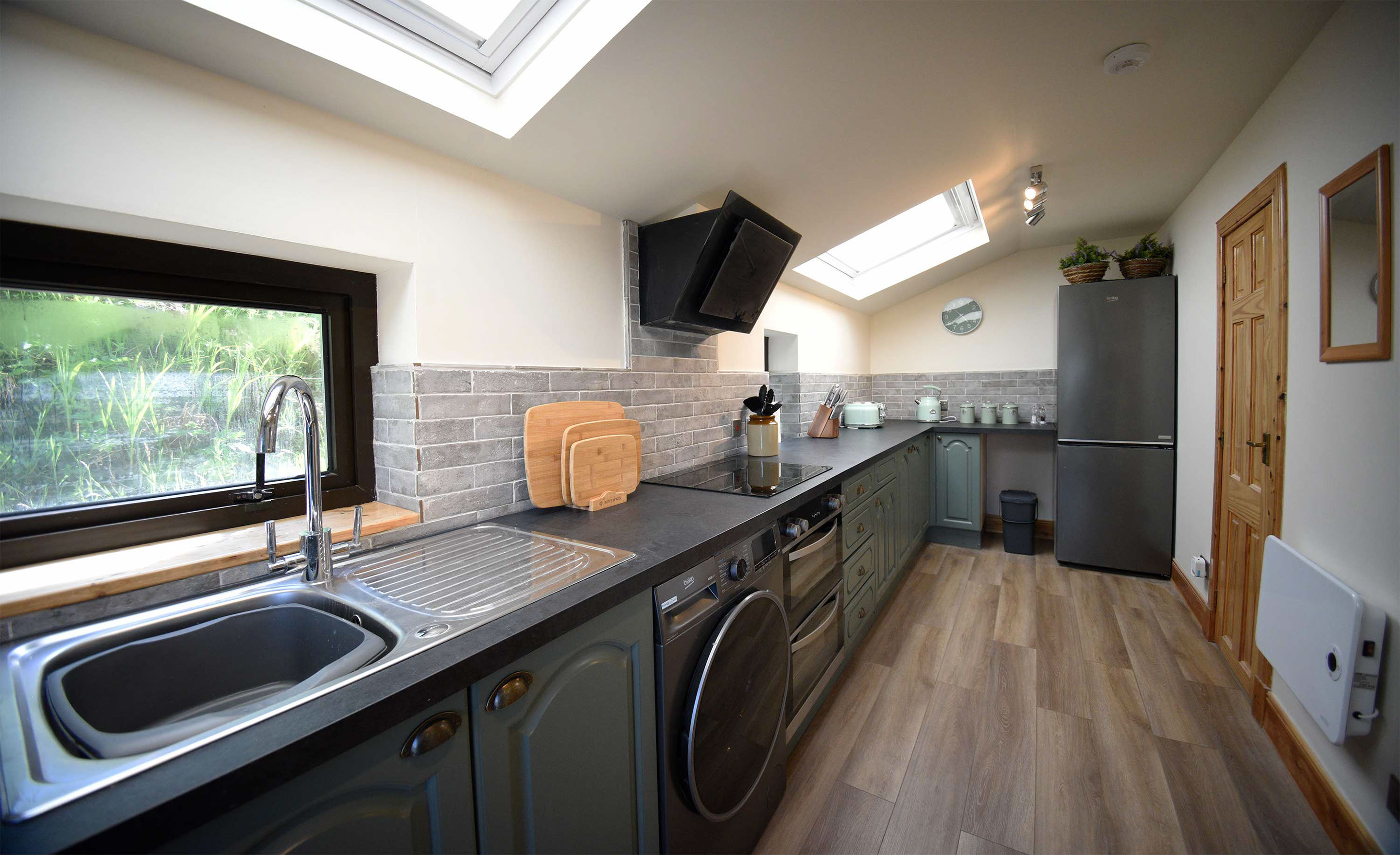 Thistle Dubh Dandy self catering accommodation contains a modern living room with kitchenette