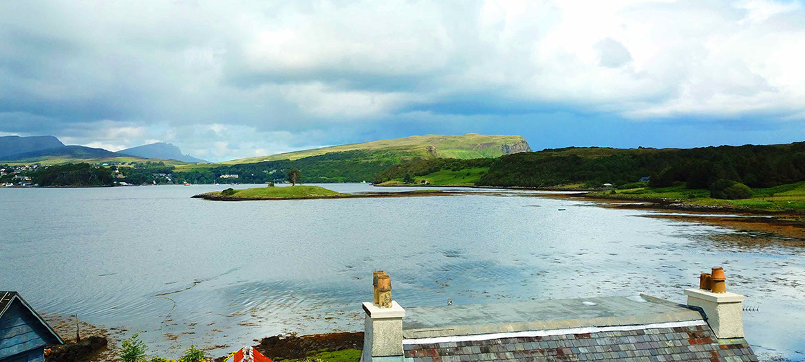 Our self catering cottage looks on to amazing sea views of Portree Bay at Caberfeidh Boat House