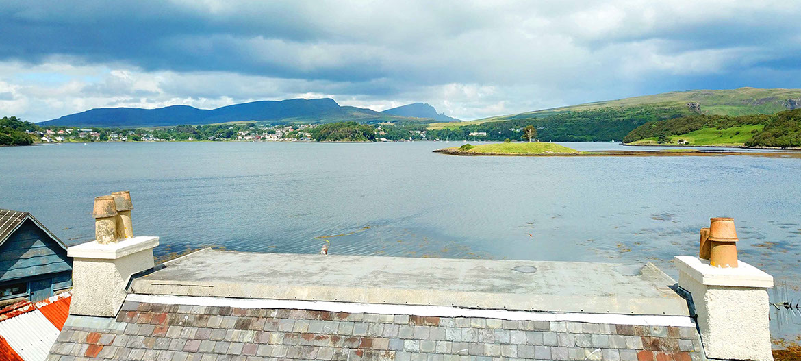 Caberfeidh Boat House is a sea view self catering accommodation cottage located near Portree with sea views of Loch Portree