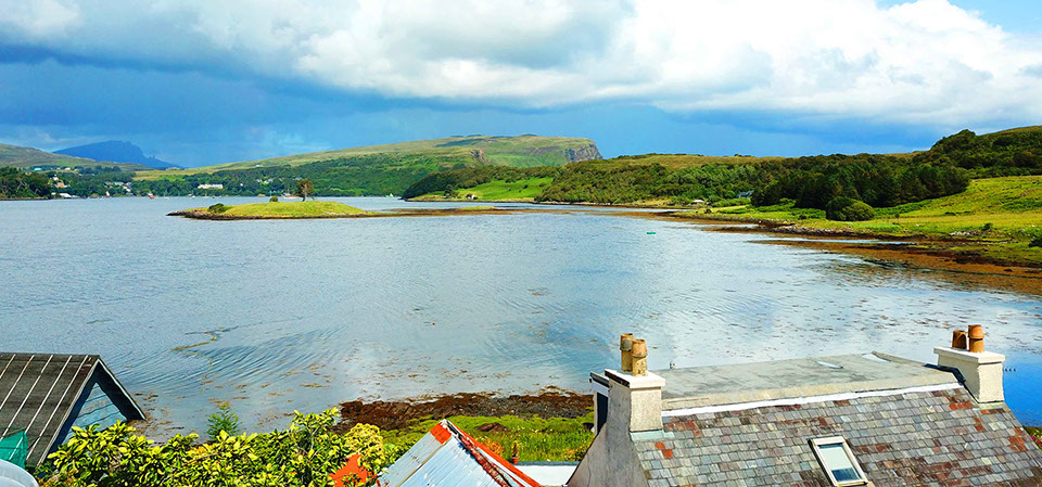 Book a stay at Caberfeidh Boat House and wake up to sea and mountain views near Portree