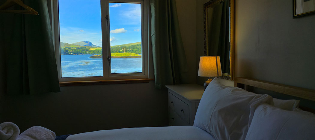 Caberfeidh Boat House contains sea view rooms looking on to amazing sea views of Loch Portree self catering accommodation